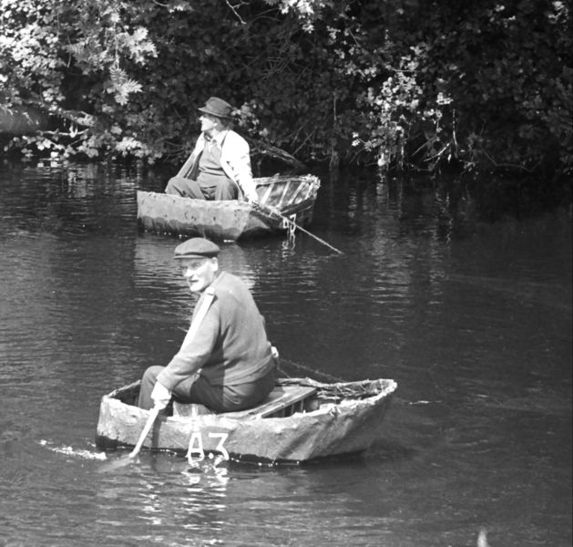 Photo of Coracles fishing on the River Teifi